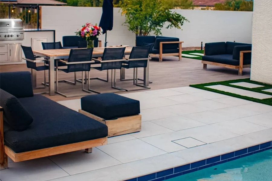 A shaded sitting area in Paradise Valley, AZ with pergola elements and modern outdoor lighting